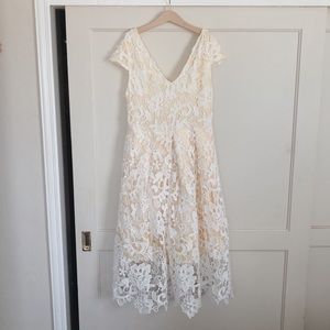 White lace overlay bridal dress